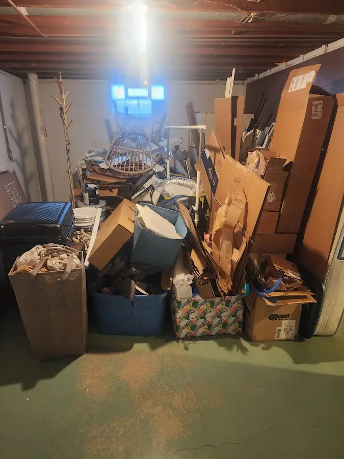 Roll-off dumpster container at job site for 2 Yard Dumpster Rental in Almira